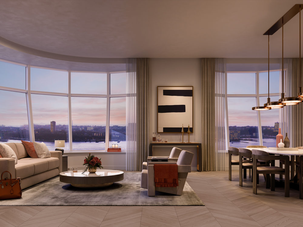 Interior view of Lantern House residence corner living room. Has window view of NYC and wood floors.