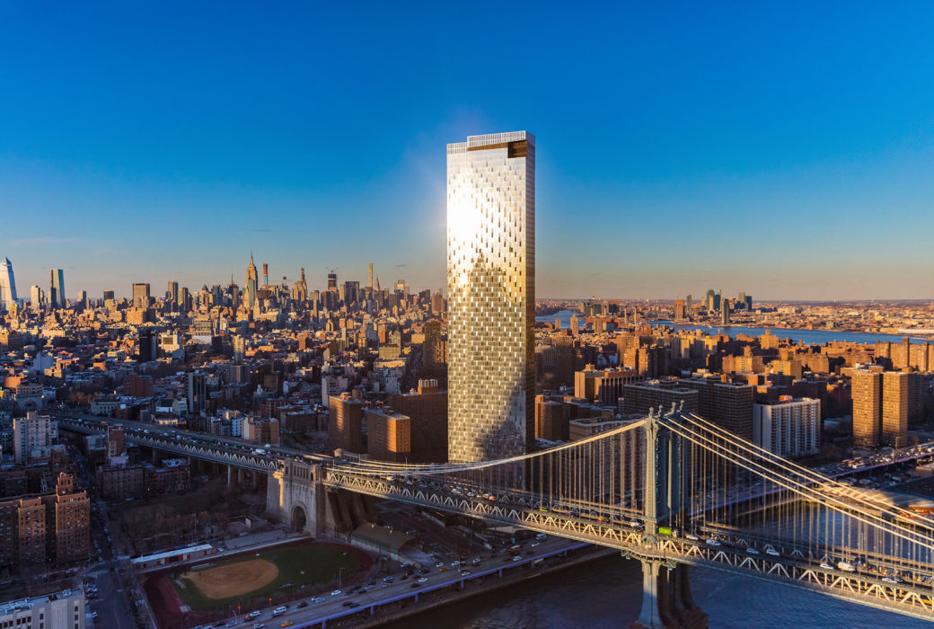 Aerial view of One Manhattan Square luxury condos in New York. Tower next to Manhattan Bridge and views of the city.