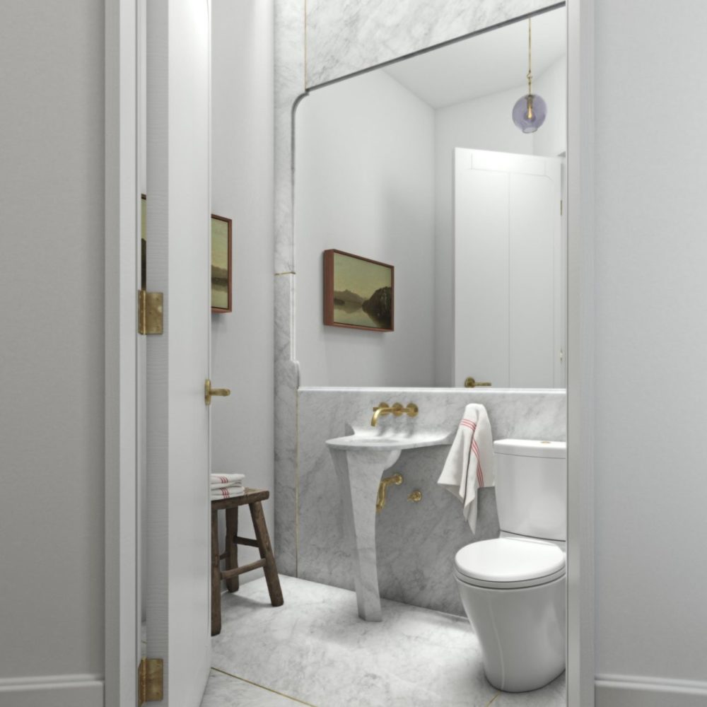 Interior view of powder room inside 180 E 88th street condominiums in NYC. Includes white, white flooring and marble trim.