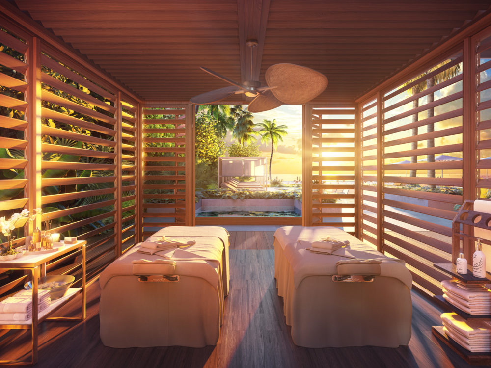 Interior view of 57 Ocean residence outdoor spa area in Miami. Has two massage tables and open wooden walls.