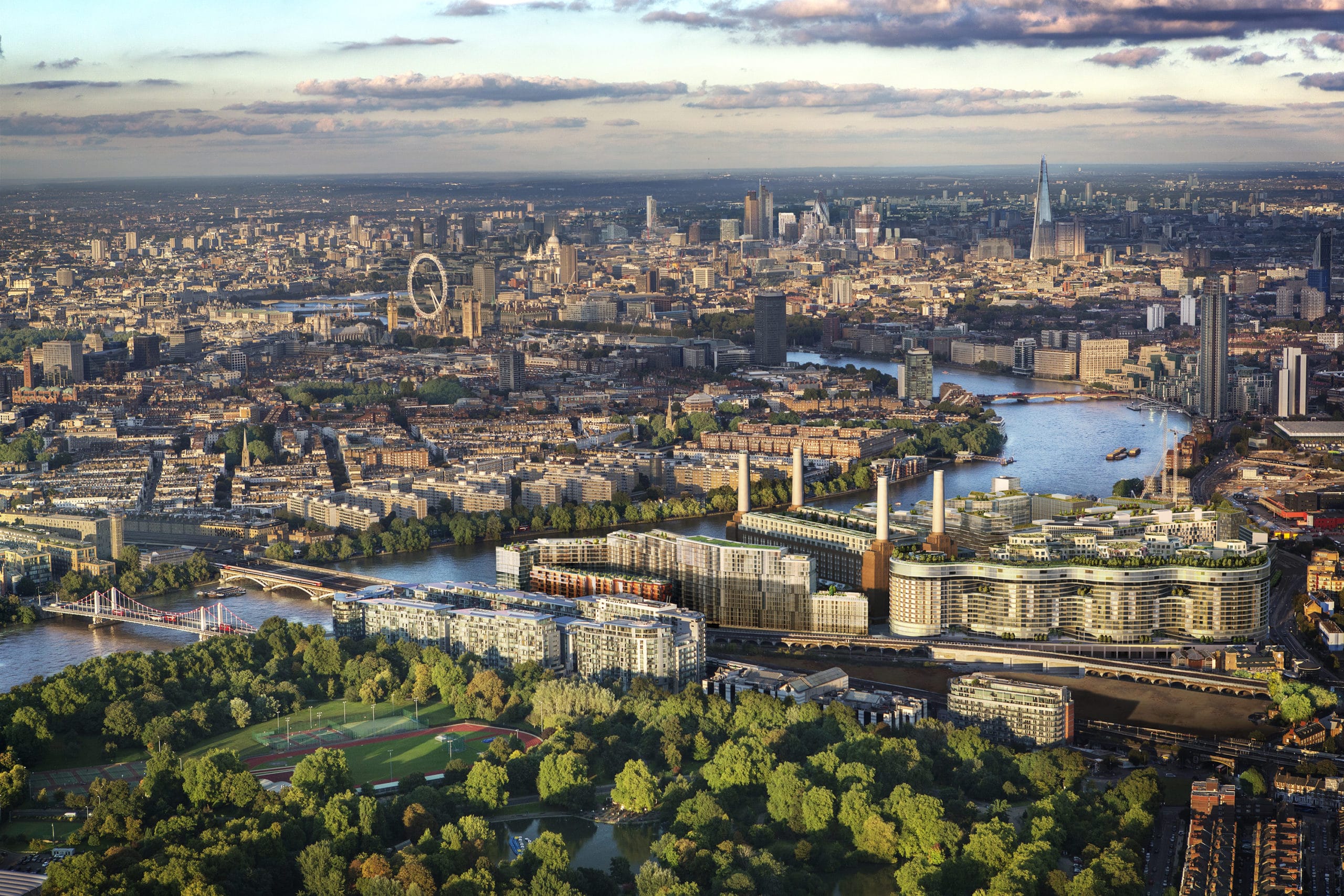 Distant aerial view of downtown London and Battersea Power Station with River Thames winding through the city.