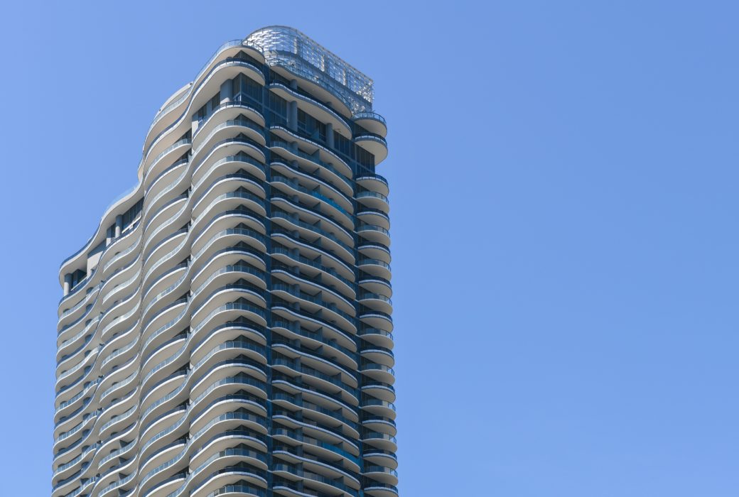 Exterior view of Brickell Flatiron condominiums detailed architecture. Has Biscayne Bay and downtown Miami view.