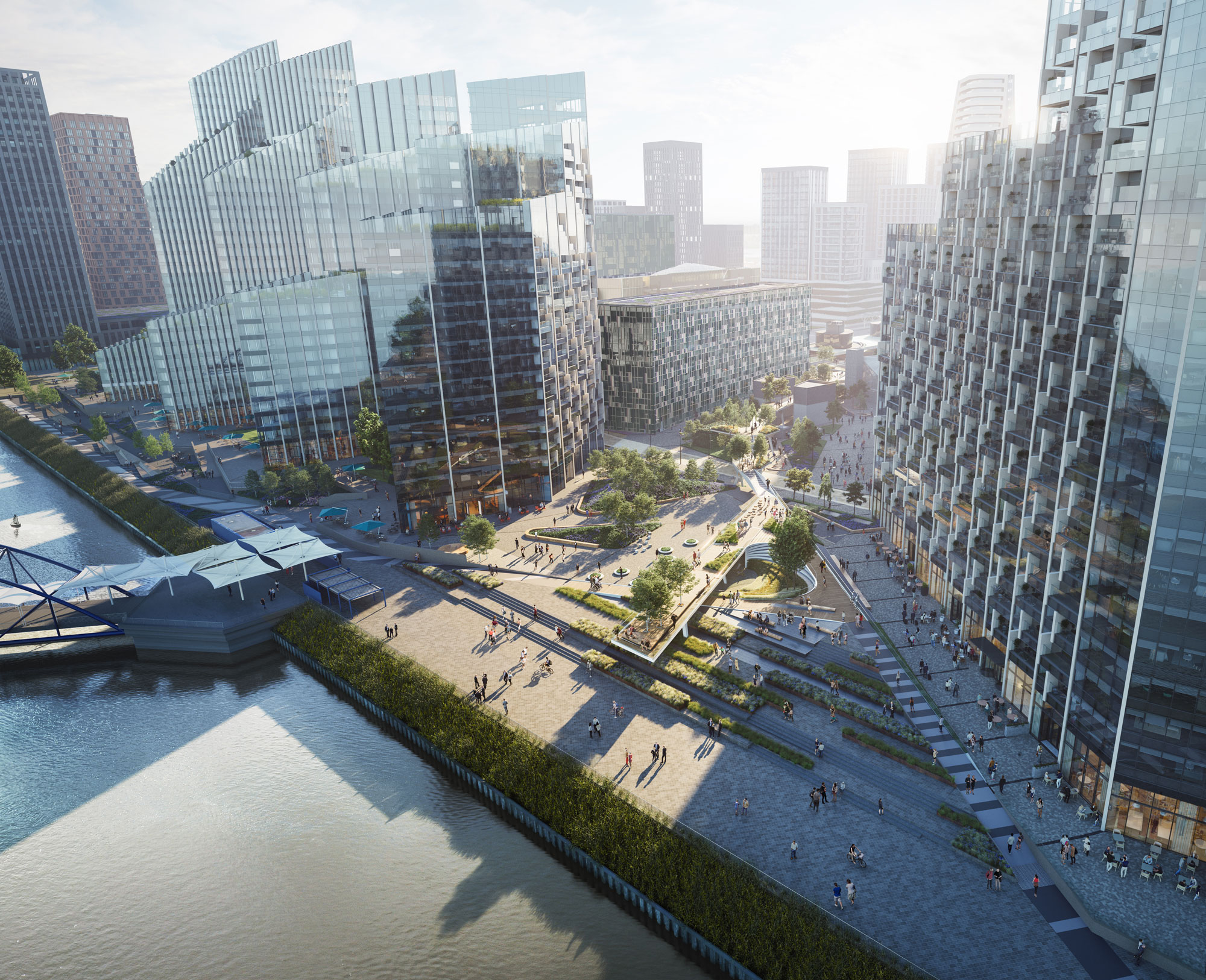 Aerial view of Greenwich Peninsula in London. Has skyline view buildings, detailed landscaping and sidewalks.