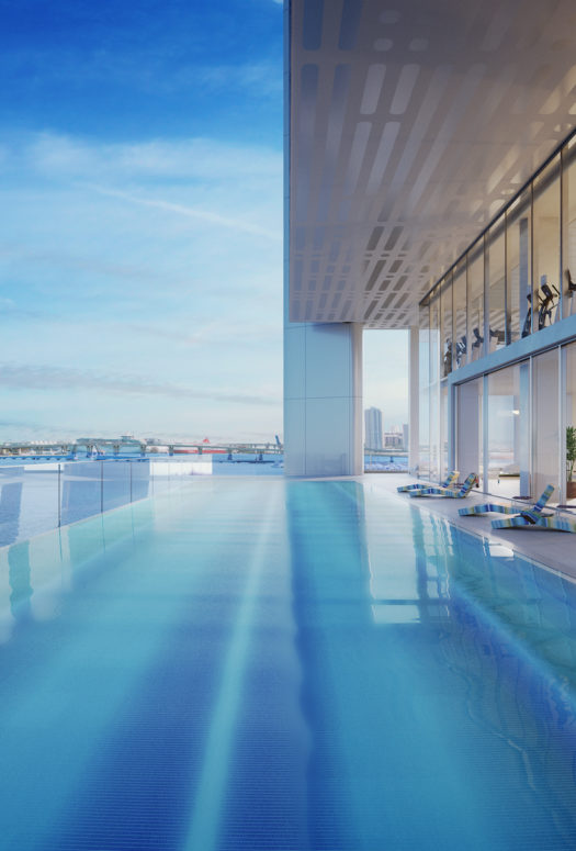 Exterior view of terrace infinity pool at Missoni Baia townhouse with oceanfront and Biscayne Bay views.