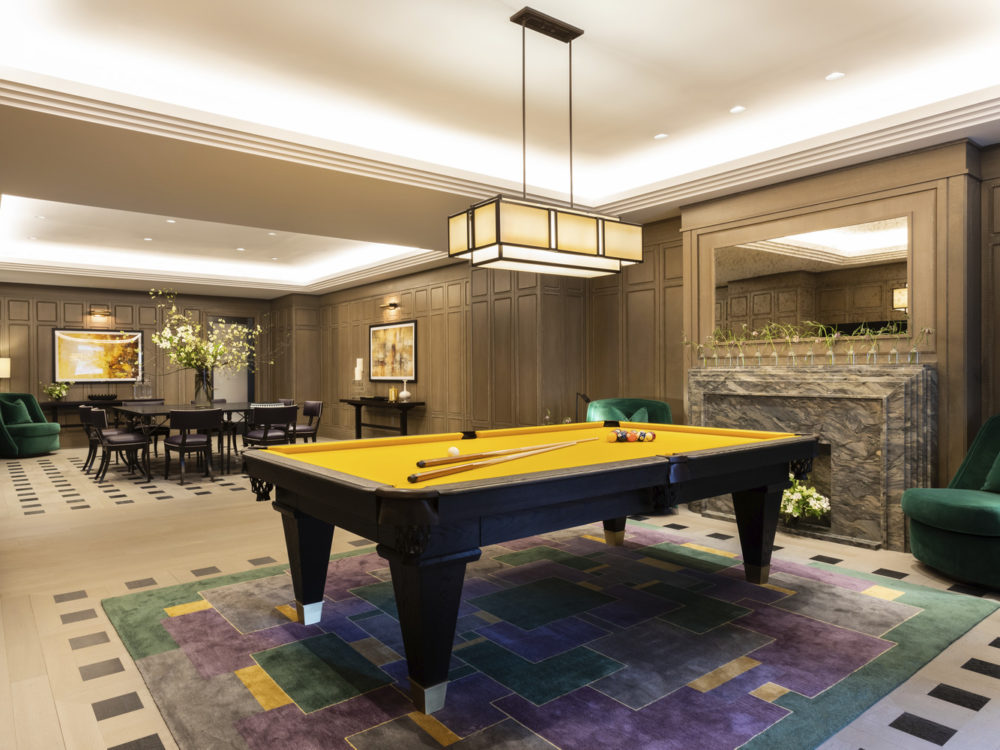 1010 Park Avenue drawing room which includes billiard table room, wood wall paneling, and timber oak skirting in NYC.