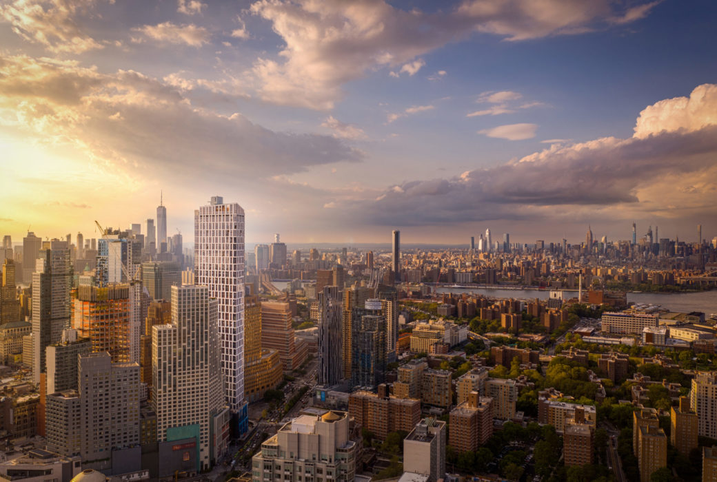 Exterior aerial view of Brooklyn, New York which includes Brooklyn Point condominiums and view of the river.