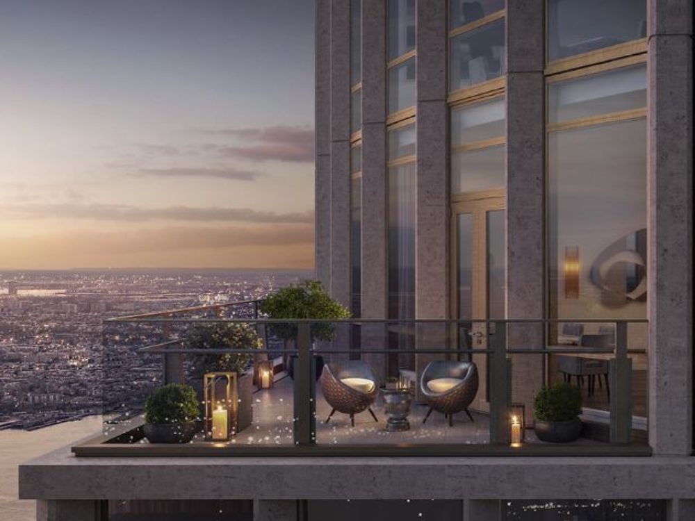 Exterior skyline view of 35 Hudson Yards condominiums in New York City. Includes view of river and NYC during the sunset.