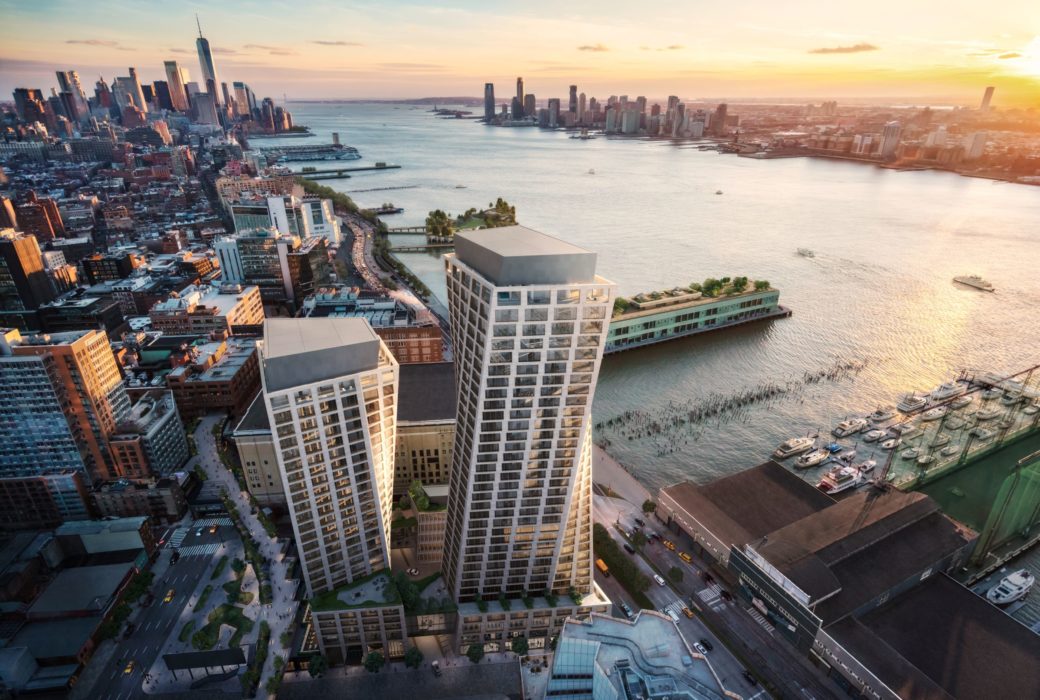 Aerial view of The Xi Condominiums in New York. Overlooking two towers & West Chelsea neighborhood next to the Hudson River.