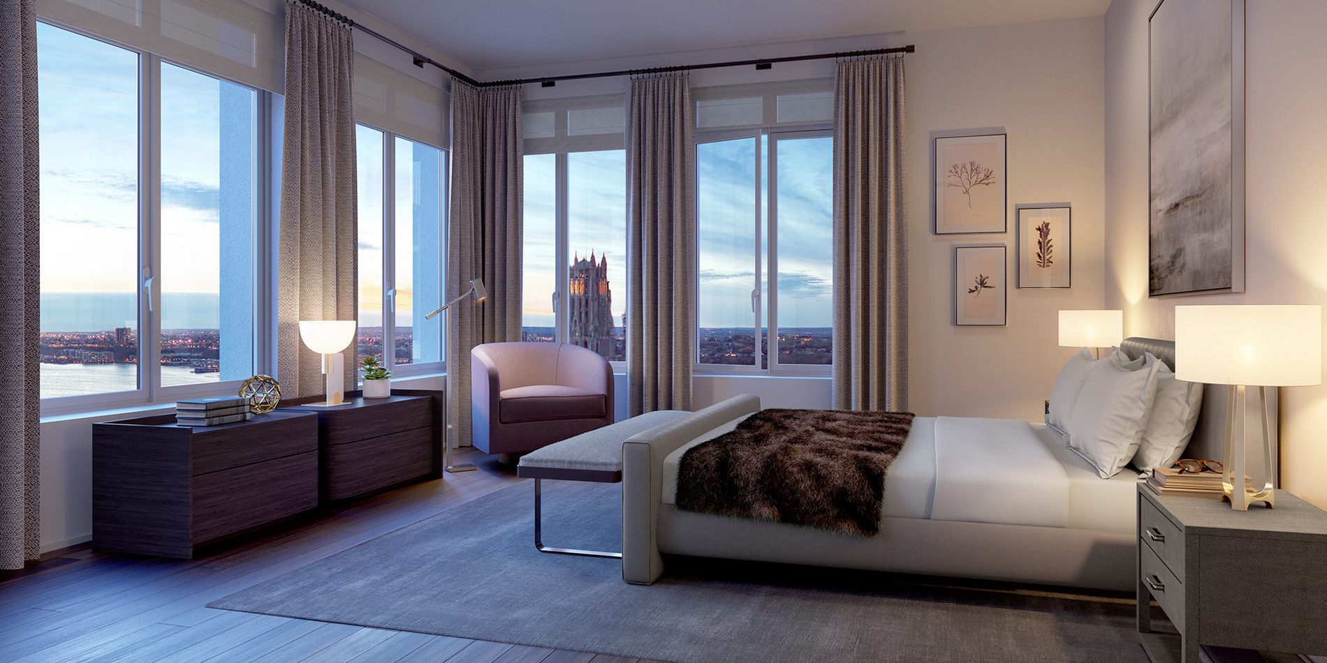 Bedroom at The Vandewater luxury condos in NYC. Corner room with bedroom furniture, floor-to-ceiling windows, and city views.