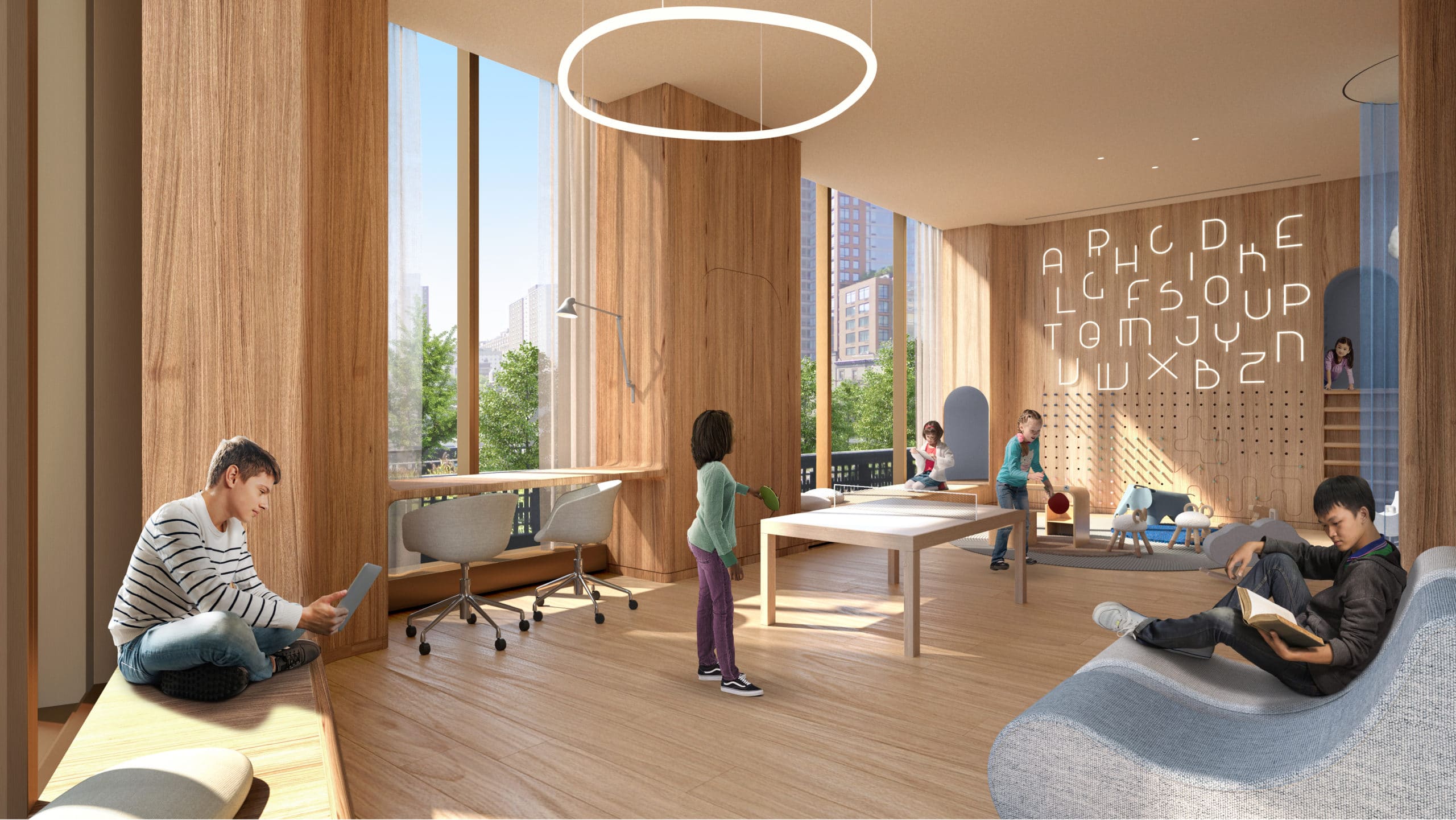 The playroom at The Xi luxury condos in NYC. Large room with chairs, couches, toys, and large windows with views.