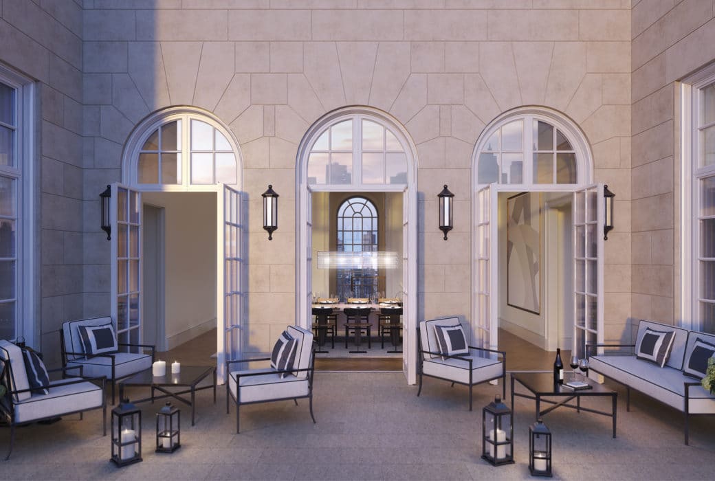 View of penthouse terrace at The Benson condos in New York. Outdoor seating with three doors and two large windows.