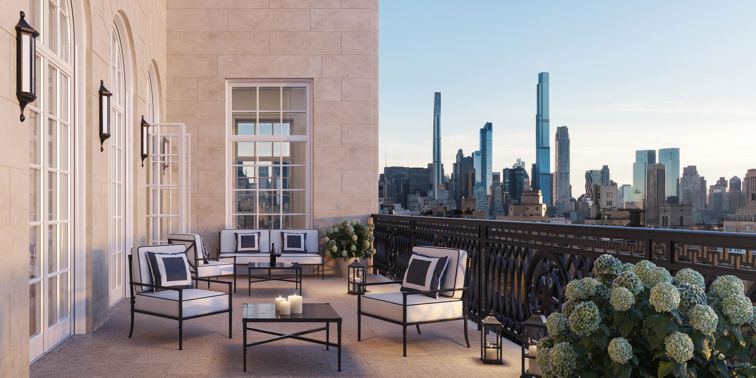 Penthouse terrace at The Benson luxury condominiums in New York. Outdoor terrace with black railing overlooking the city.