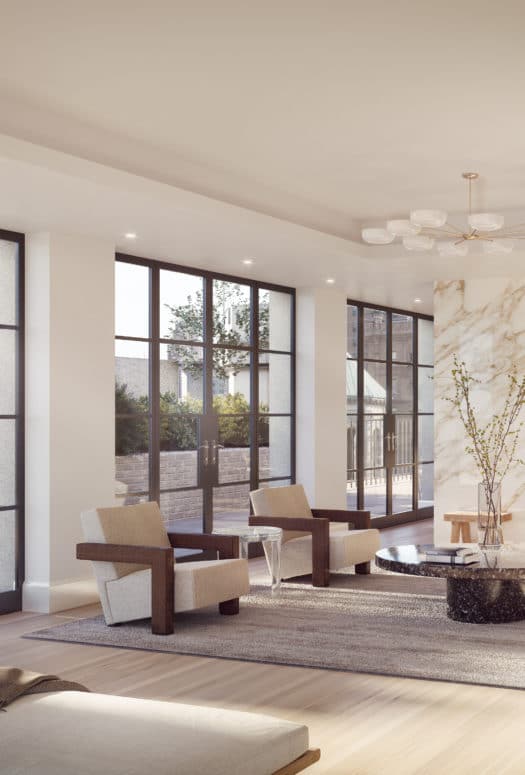 Living room in the Penthouse at 555 West End Ave luxury condos in New York City. Open room with fireplace and terrace access.